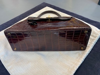 Lot 65 - An Hermès brown crocodile Kelly bag, late 1960s