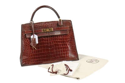 Lot 5 - An Hermès brown crocodile Kelly bag, late 1960s