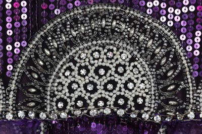 Lot 64 - A fine and rare Paul Poiret purple sequined evening dress, 1928