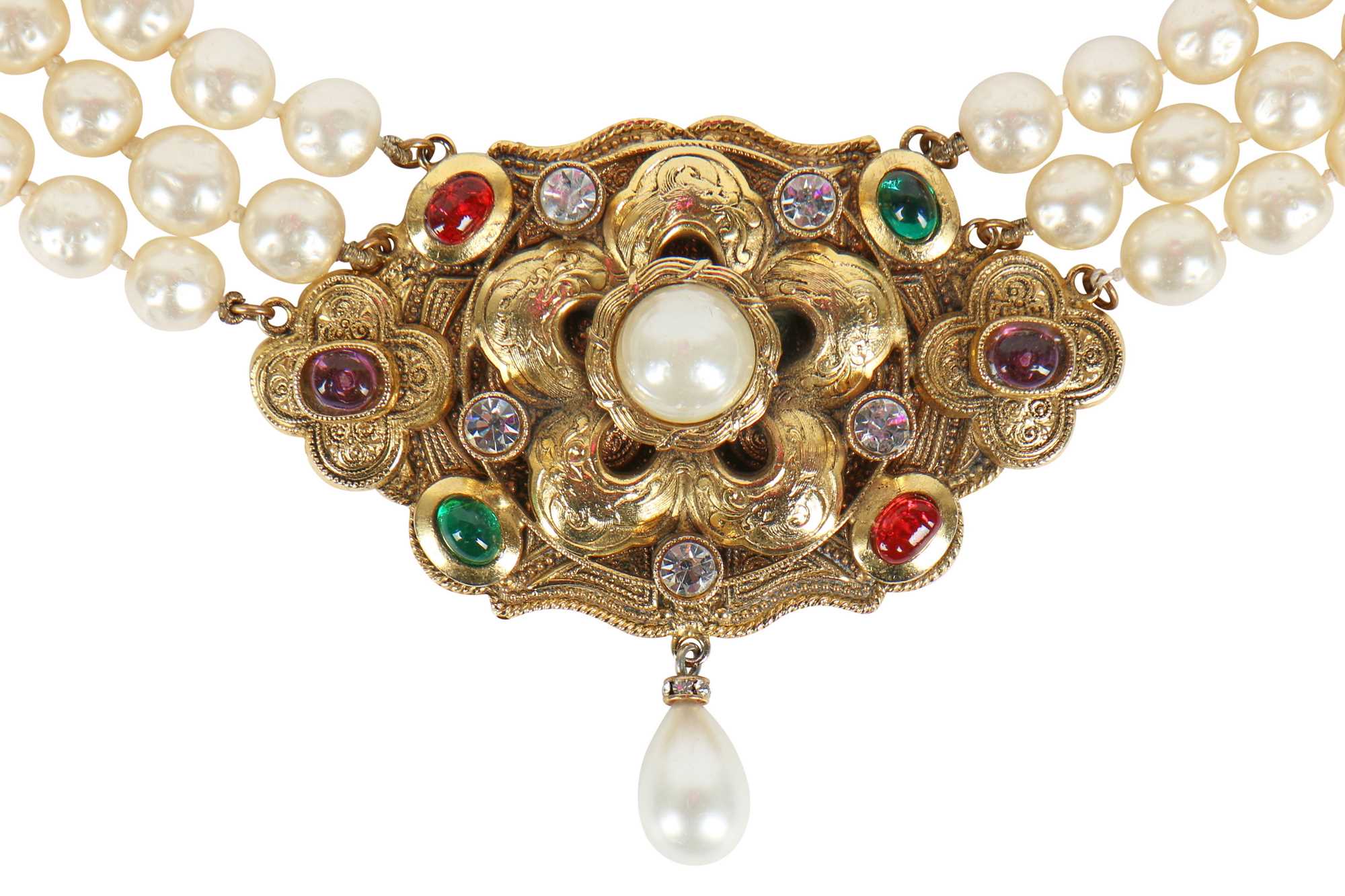 Lot 13 - A fine Chanel three-strand 'pearl' necklace with bejewelled gilt plaquette, 1971-1981