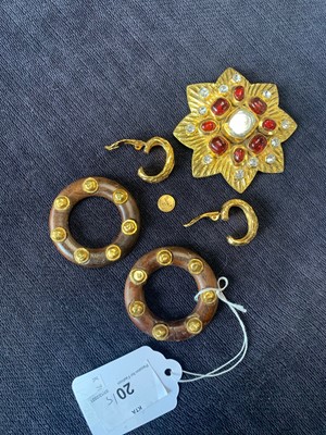 Lot 20 - A Chanel gilt eight-pointed flower-head-shaped brooch, 1985