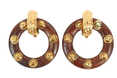 Lot 20 - A Chanel gilt eight-pointed flower-head-shaped brooch, 1985