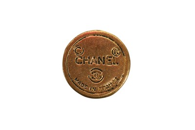 Lot 20 - A Chanel gilt eight-pointed flower-head-shaped brooch, 1985