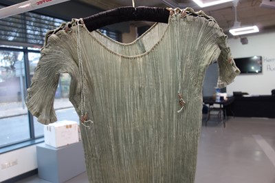 Lot 57 - A Mariano Fortuny pale-aqua pleated silk Delphos gown, 1920-30