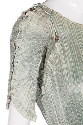 Lot 57 - A Mariano Fortuny pale-aqua pleated silk Delphos gown, 1920-30