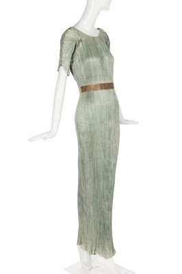 Lot 57 - A Mariano Fortuny pale-aqua pleated silk Delphos gown, 1920-30