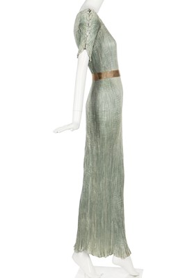 Lot 57 - A Mariano Fortuny pale-aqua pleated silk Delphos gown, 1920-30