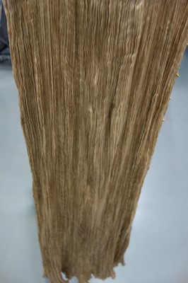Lot 58 - A Mariano Fortuny pale-gold pleated silk Delphos gown, 1920-30