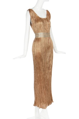 Lot 58 - A Mariano Fortuny pale-gold pleated silk Delphos gown, 1920-30