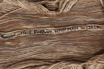 Lot 58 - A Mariano Fortuny pale-gold pleated silk Delphos gown, 1920-30