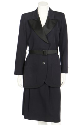 Lot 147 - An Yves Saint Laurent 'Le Smoking' skirt suit, 1980s