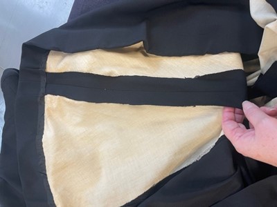Lot 72 - A black wool coat dress, Dior, made under licence, American, circa 1947