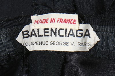 Lot 75 - A Balenciaga couture black wool dinner dress, Spring-Summer 1950