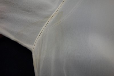 Lot 54 - An ivory chiffon couture dinner dress, attributed to Gabrielle Chanel, circa 1925
