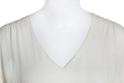 Lot 54 - An ivory chiffon couture dinner dress, attributed to Gabrielle Chanel, circa 1925
