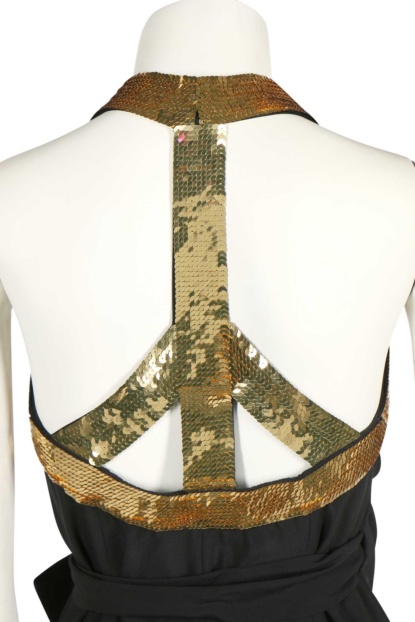 Lot 196 - A Moschino cocktail dress with gold-sequined 'Peace' sign halter-neck bodice, Spring-Summer 1994