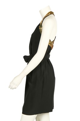 Lot 196 - A Moschino cocktail dress with gold-sequined 'Peace' sign halter-neck bodice, Spring-Summer 1994
