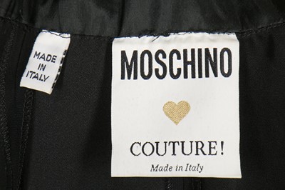 Lot 196 - A Moschino cocktail dress with gold-sequined 'Peace' sign halter-neck bodice, Spring-Summer 1994