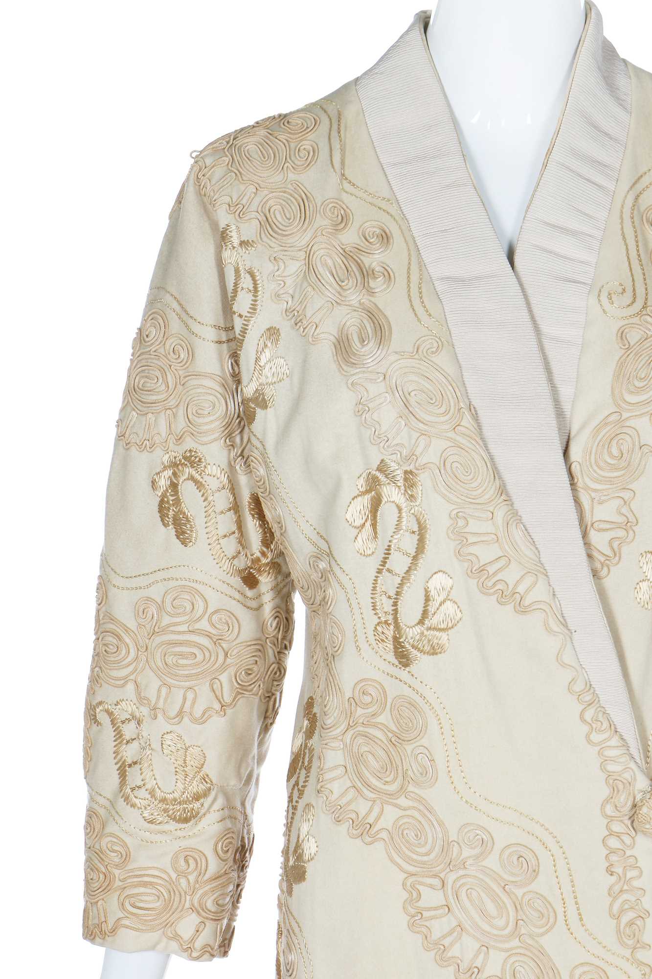 Lot 49 - A Stern Brothers ivory wool coat, 1910s