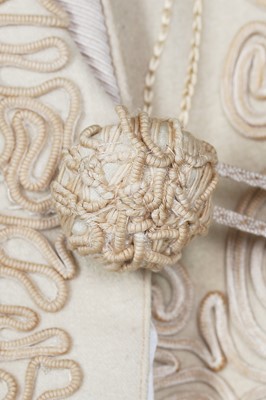 Lot 49 - A Stern Brothers ivory wool coat, 1910s