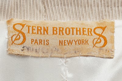Lot 49 - A Stern Brothers ivory wool coat, 1910s