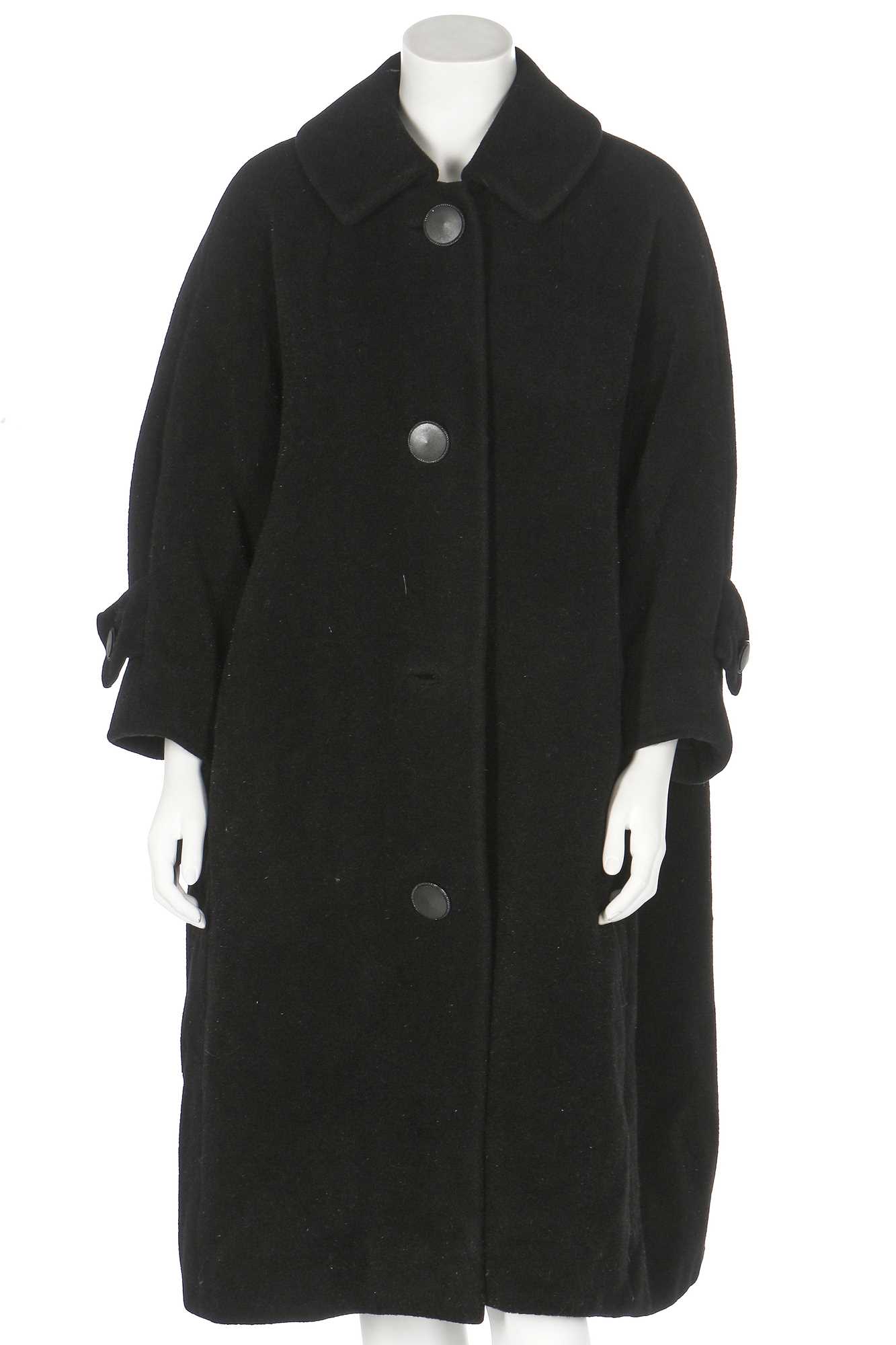 Lot 83 - A Christian Dior by Yves Saint Laurent couture black wool tent coat, 1958-60