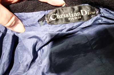 Lot 83 - A Christian Dior by Yves Saint Laurent couture black wool tent coat, 1958-60