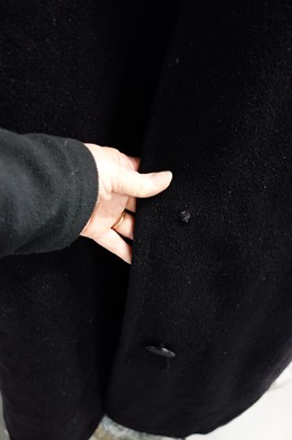 Lot 83 - A Christian Dior by Yves Saint Laurent couture black wool tent coat, 1958-60