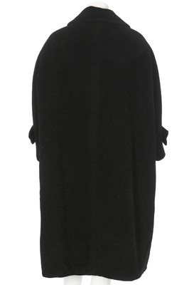 Lot 83 - A Christian Dior by Yves Saint Laurent couture black wool tent coat, 1958-60
