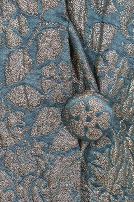 Lot 56 - A good lamé opera coat in shades of silver and sea-green, 1930s