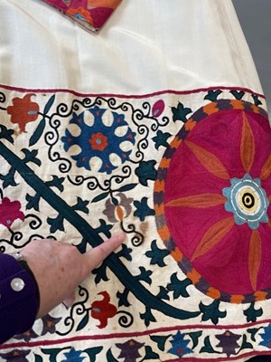 Lot 65 - An ivory silk summer coat made from a Central Asian embroidered suzani, circa 1928