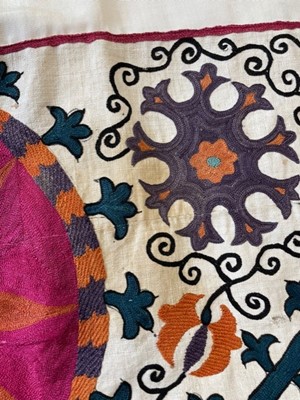 Lot 65 - An ivory silk summer coat made from a Central Asian embroidered suzani, circa 1928