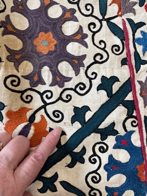 Lot 65 - An ivory silk summer coat made from a Central Asian embroidered suzani, circa 1928
