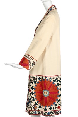 Lot 65 - An ivory silk summer coat made from a Central Asian embroidered suzani, circa 1928