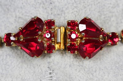 Lot 24 - A Dior necklace of faceted 'ruby' rhinestones set in a gilt metal mount, 1962