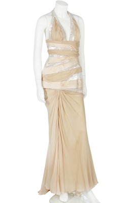 Lot 252 - A Versace pale gold chiffon 'Donna' evening gown, Autumn-Winter 2006