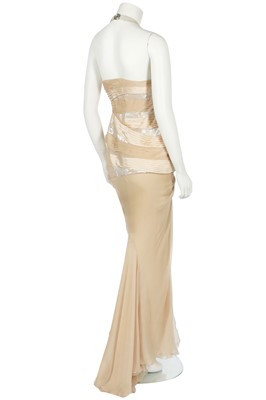 Lot 252 - A Versace pale gold chiffon 'Donna' evening gown, Autumn-Winter 2006