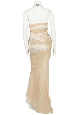 Lot 252 - A Versace pale gold chiffon 'Donna' evening gown, Autumn-Winter 2006