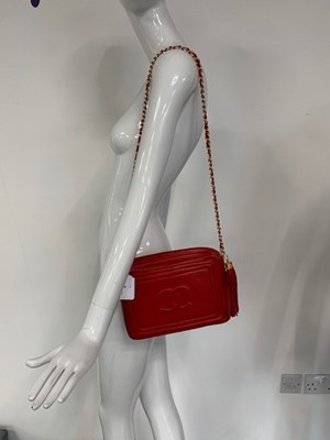 Lot 6 - A Chanel fire-engine-red lambskin leather handbag, 1986-88