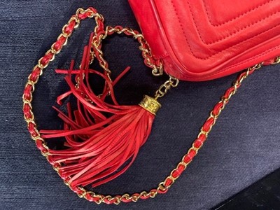 Lot 6 - A Chanel fire-engine-red lambskin leather handbag, 1986-88