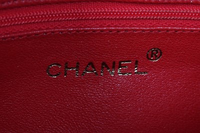 Lot 6 - A Chanel fire-engine-red lambskin leather handbag, 1986-88