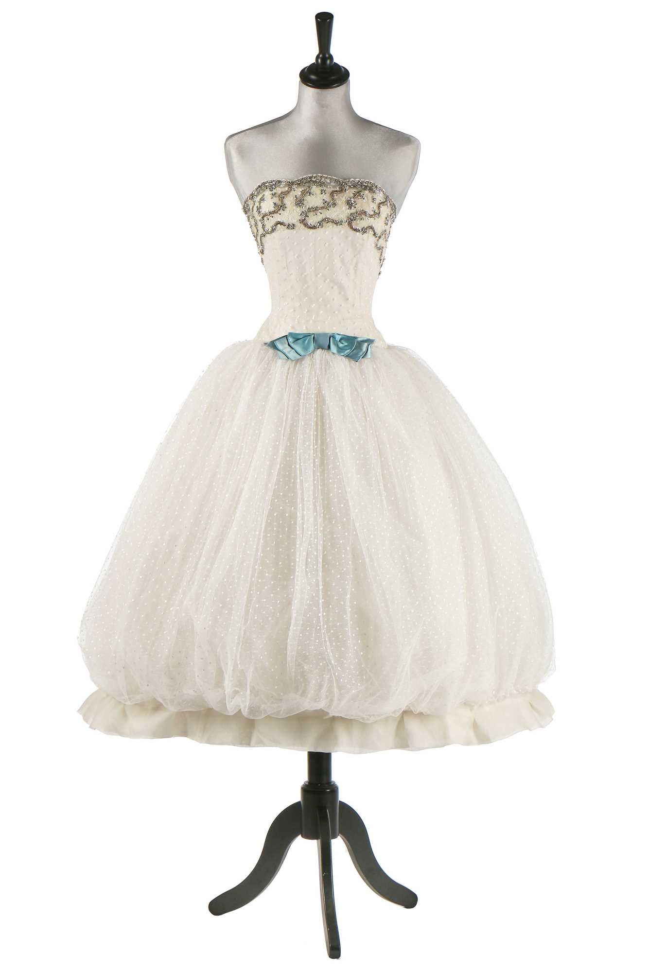 Lot 79 - Audrey Hepburn's Givenchy haute couture white point d'esprit ball gown worn in the opera scene of 'Love in the Afternoon', 1956