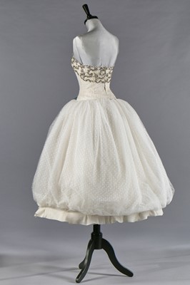 Lot 79 - Audrey Hepburn's Givenchy haute couture white point d'esprit ball gown worn in the opera scene of 'Love in the Afternoon', 1956