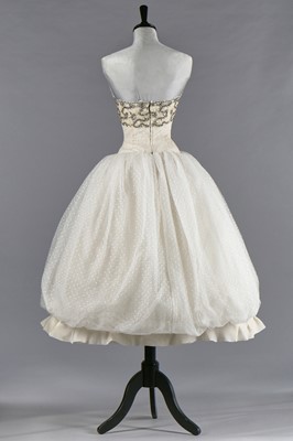 Lot 79 - Audrey Hepburn's Givenchy haute couture white point d'esprit ball gown worn in the opera scene of 'Love in the Afternoon', 1956