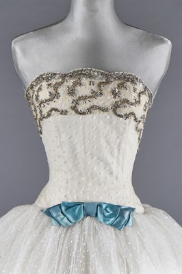 Lot 79 - Audrey Hepburn's Givenchy haute couture white point d'esprit ball gown worn in the opera scene of 'Love in the Afternoon', 1956