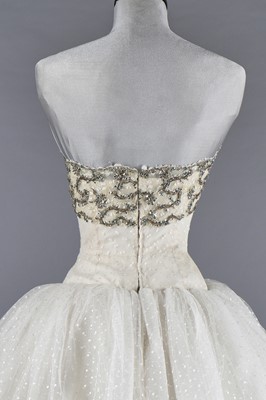 Lot 79 - Audrey Hepburn's Givenchy haute couture white point d'esprit ball gown worn in the opera scene of 'Love in the Afternoon', 1956