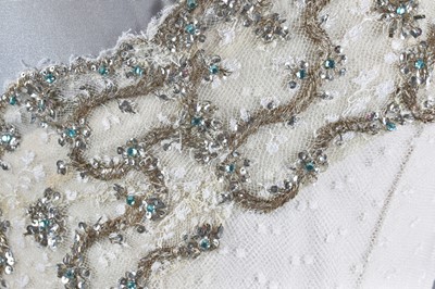 Lot 79 - Audrey Hepburn's Givenchy haute couture white point d'esprit ball gown worn in the opera scene of 'Love in the Afternoon', 1956