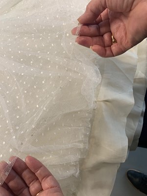 Lot 79 - Audrey Hepburn's Givenchy haute couture white point d'esprit ball gown worn in the opera scene of 'Love in the Afternoon', 1956