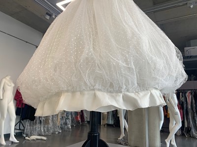 Lot 79 - Audrey Hepburn's Givenchy haute couture white point d'esprit ball gown worn in the opera scene of 'Love in the Afternoon', 1956