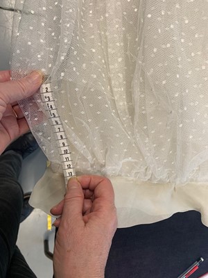 Lot 79 - Audrey Hepburn's Givenchy haute couture white point d'esprit ball gown worn in the opera scene of 'Love in the Afternoon', 1956
